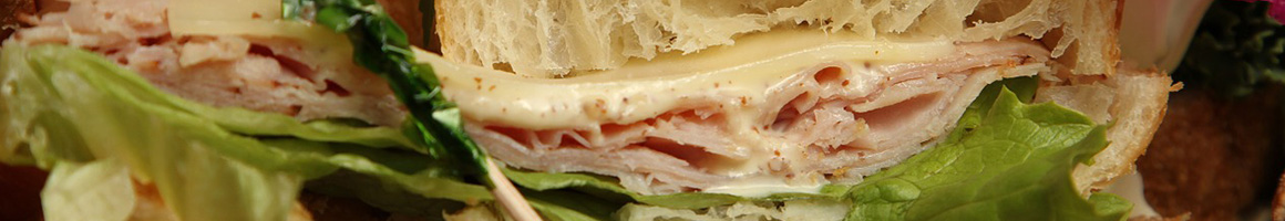 Eating Pizza Sandwich at John & Mary's A-Bomb Subs restaurant in Cheektowaga, NY.